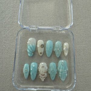 Elegant Ocean-Inspired Nail Tips in Blue and White